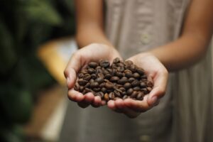 coffee beans in hand