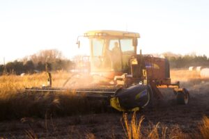 harvesting with the sunset